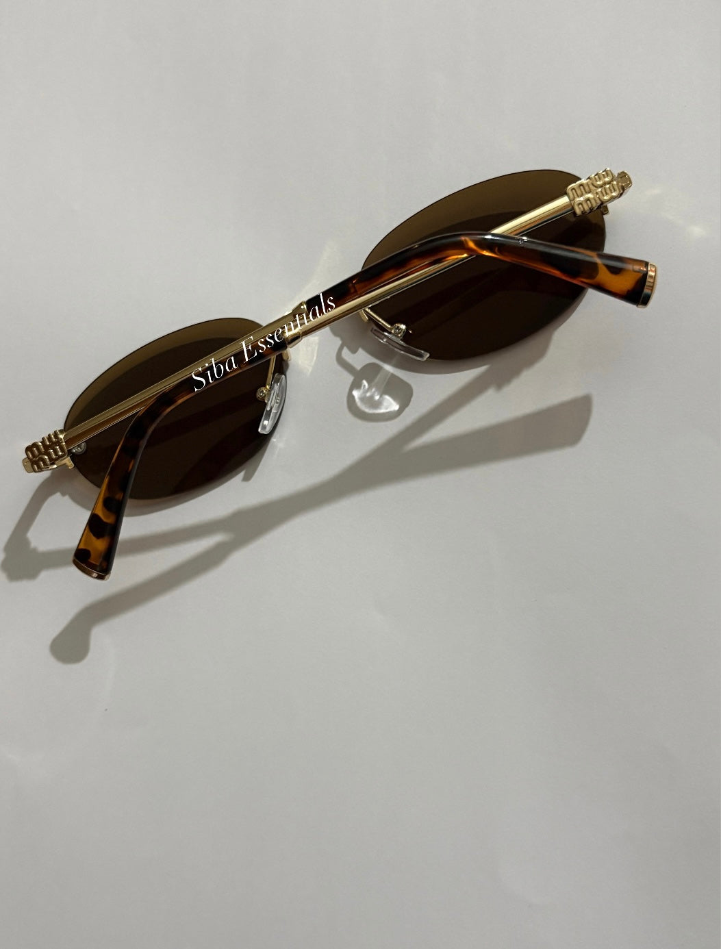 Miu Miu sunglasses (brown )
