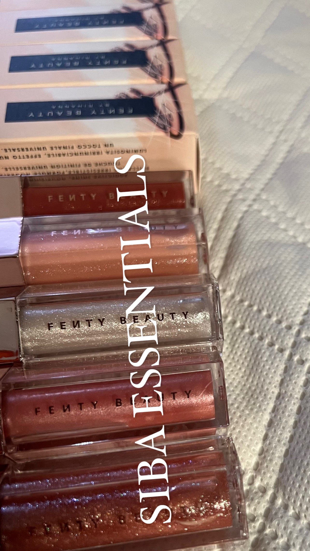 FENTY BEAUTY SHIMMERING UNIVERSAL LIP LUMINIZER GLOSS BOMB ( full size ) 9 ml