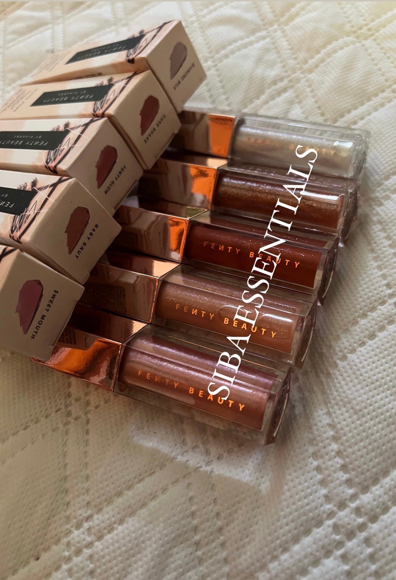 FENTY BEAUTY SHIMMERING UNIVERSAL LIP LUMINIZER GLOSS BOMB ( full size ) 9 ml